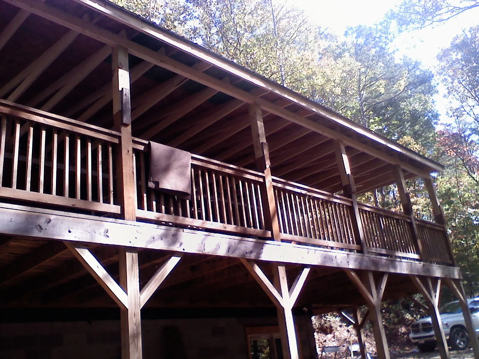 Timber framing under a new elevated porch and deck — Roof Leak Repair in Rosedale by Roofing Brothers